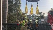 Load and play video in Gallery viewer, Wind Chime with Yellow Vintage Glass Bottles and Sea Glass
